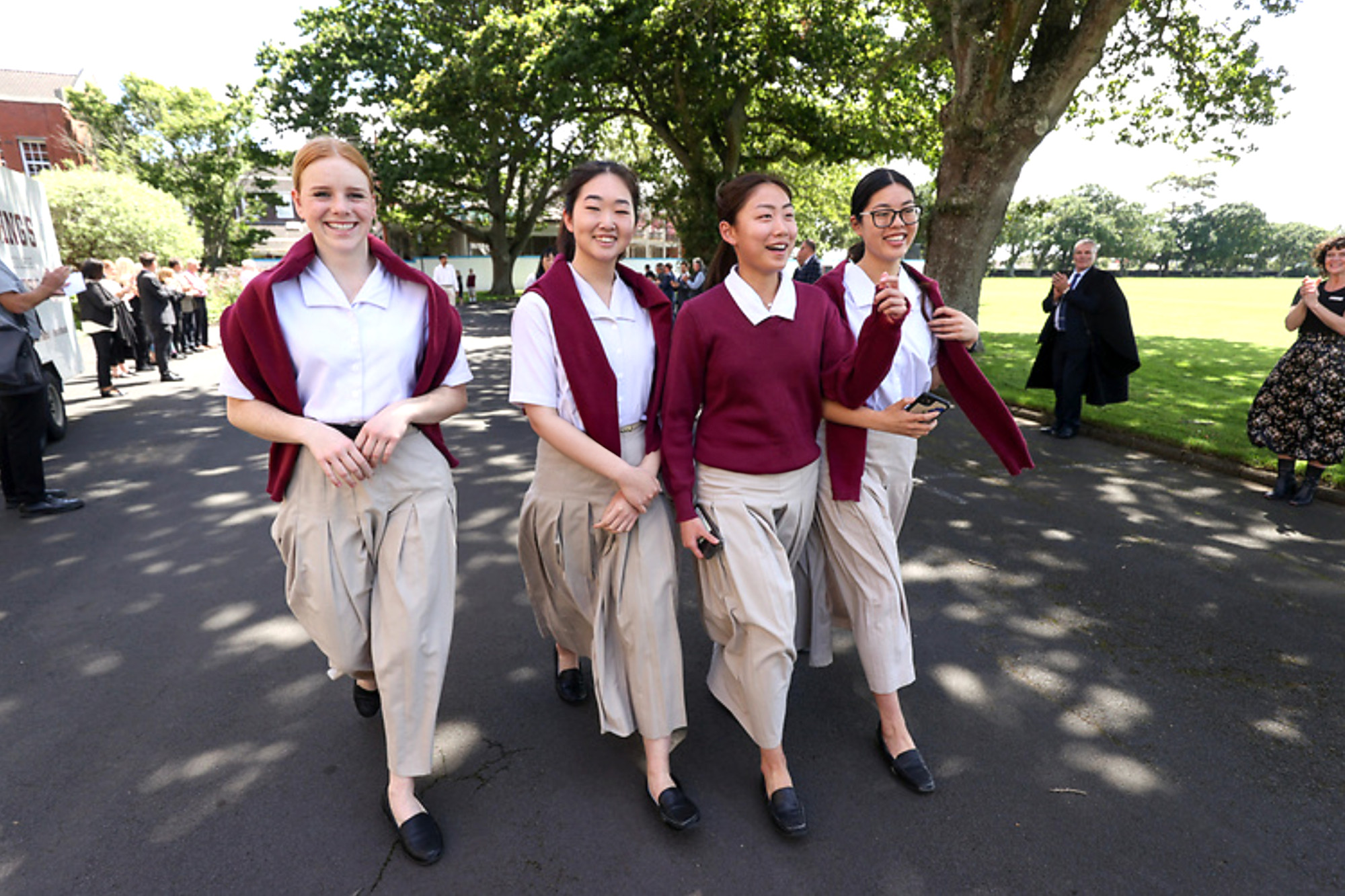 Girls walking down the drive