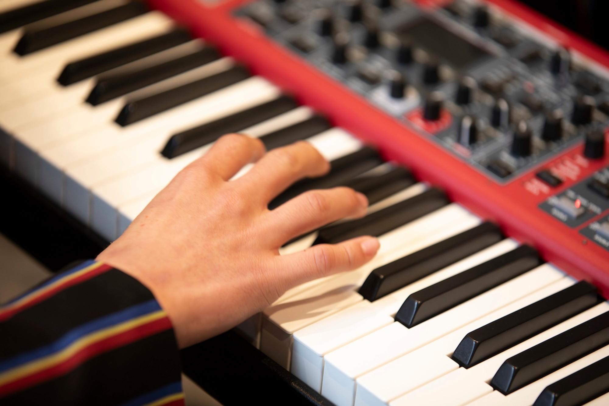 Student playing the keyboard