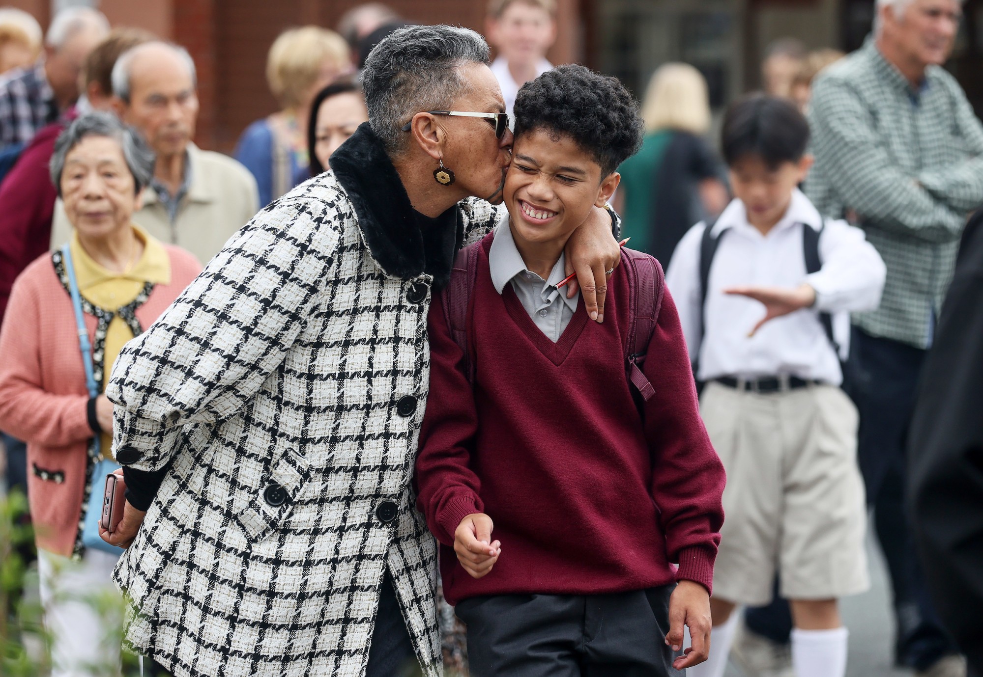 Grandmother Kissing her grandson