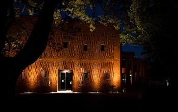 Toi Manawa, the performing arts centre lit up at night